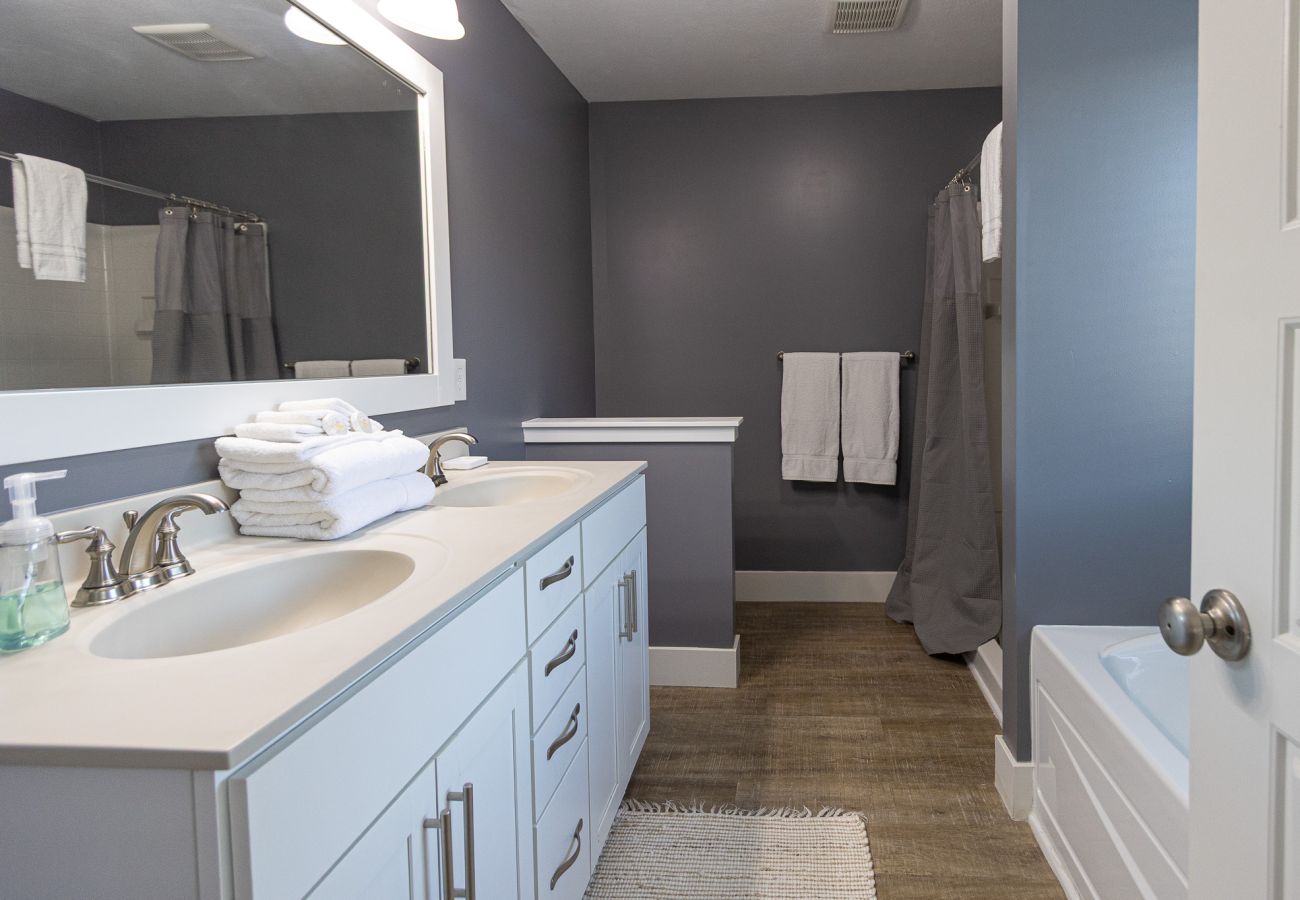 Bathroom with double vanity, walk-in shower, and soaking tub- Bridgewater