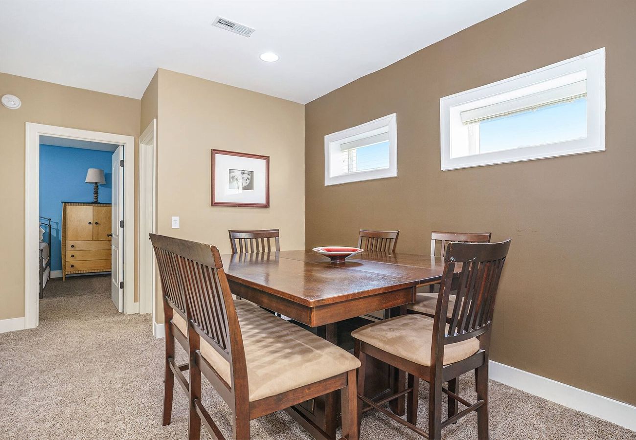 Table with seating for six located in basement- Wildflower