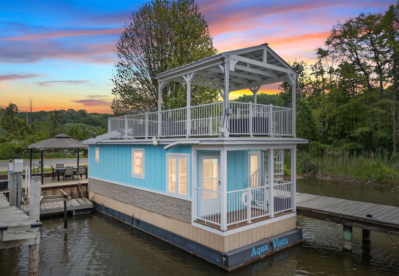 Aqua Vista floating cottage with two outdoor decks and waterfront views  in South haven, Michigan