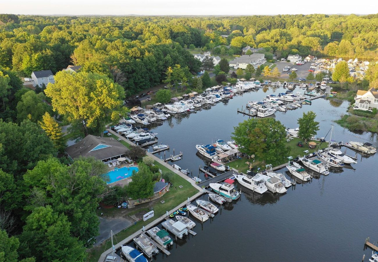 Aerial view of Woodland Harbor with pool, clubhouse, and access to Bluewater Boat Rentals in South Haven MI 