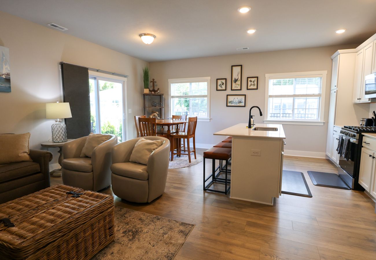 Open- Concept living room, dining area, and kitchen