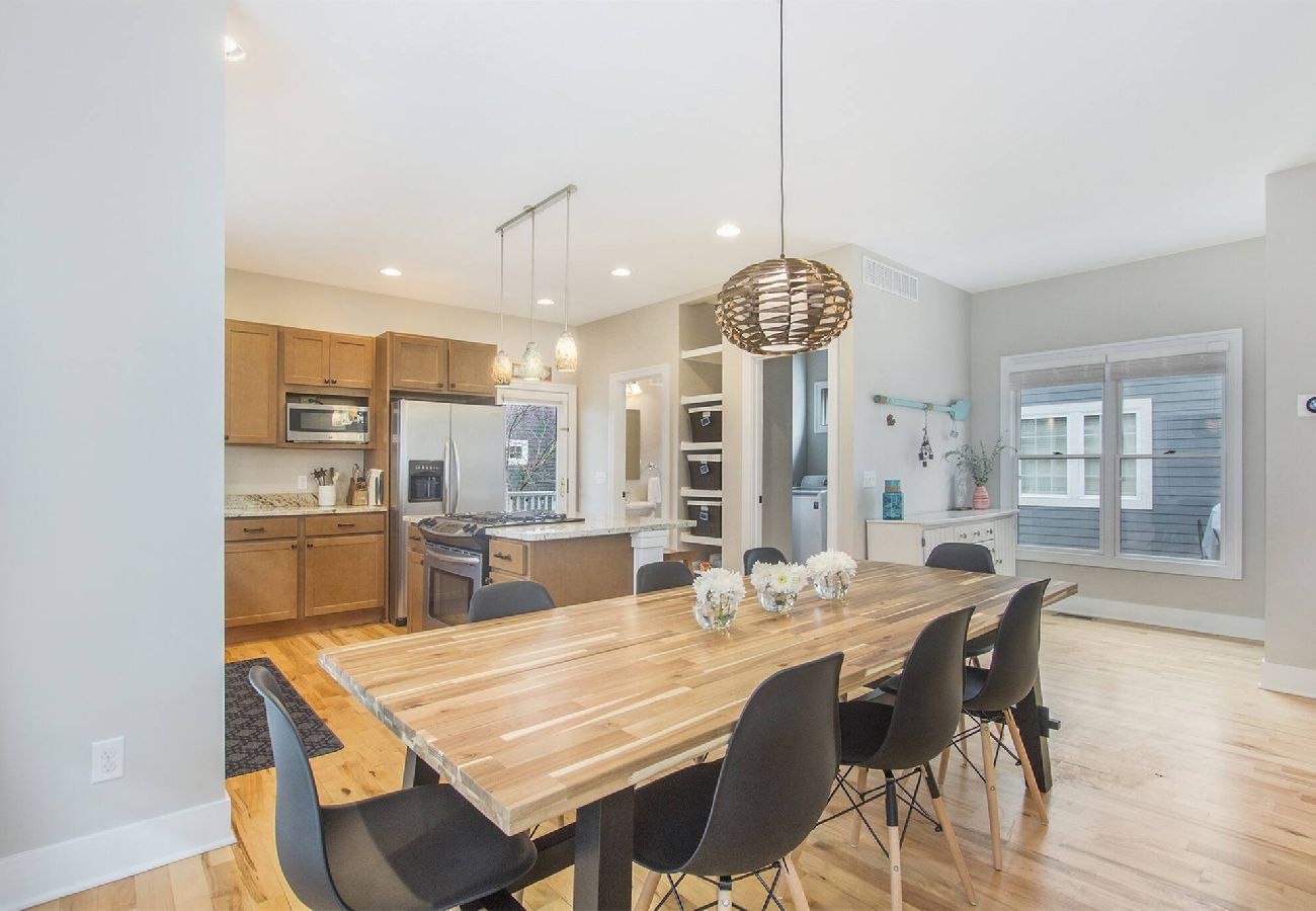 Bright kitchen and large dining table with modern appliances in South Haven