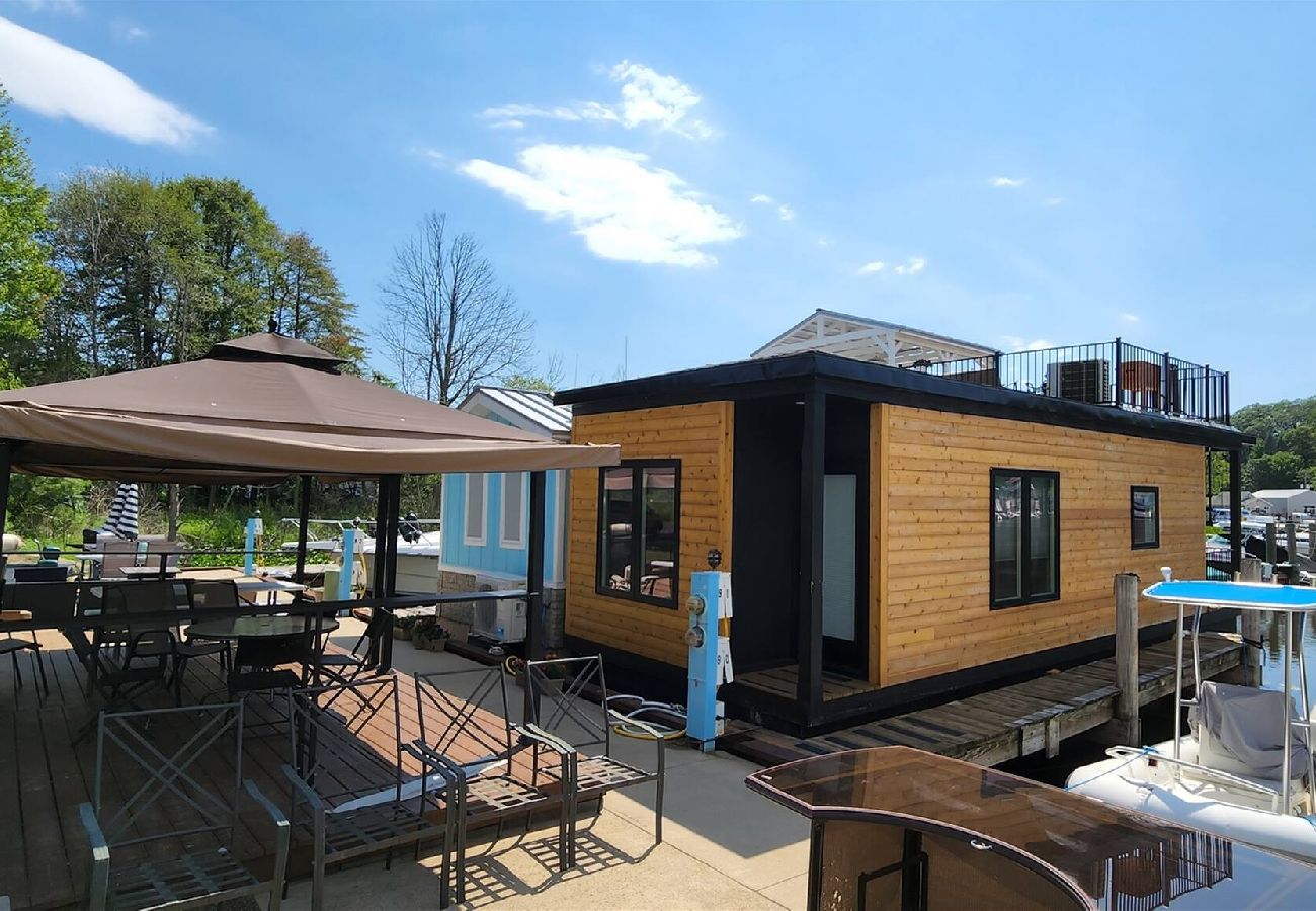 Patio,gas grill.tiny floating cottage