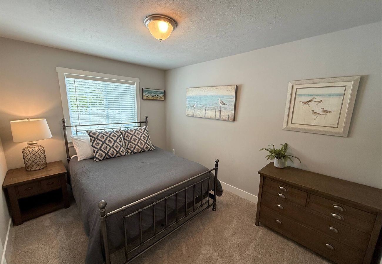 Queen beach vibe bedroom located in South Haven,MI